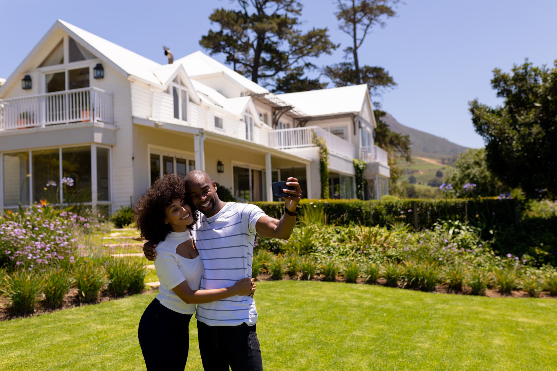 Couple taking a selfie in a garden
